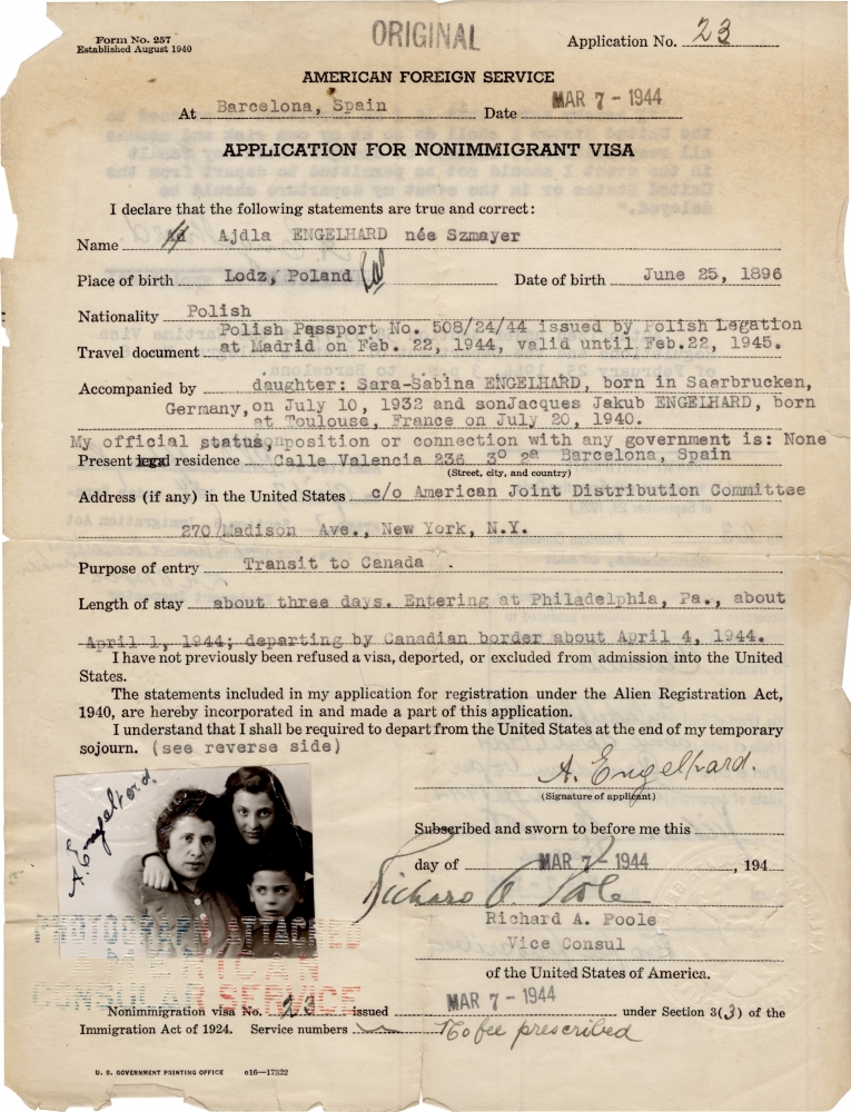 Copy of an original, one-page document with typed writing and handwritten signature at the bottom, dated March 7 1944. A small black-and-white identity picture is attached to the paper in the bottom-left corner, featuring a woman and two children. The paper’s edges are slightly torn.