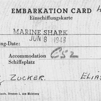 Copy of an embarkation card document. The document has typed writing, a stamp for ‘MARINE SHARK JUN 8 1948’, and includes handwriting.